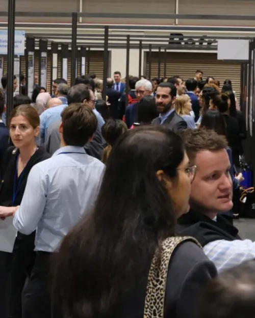 people at meeting exhibit